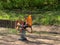 View at rocking horse mounted on a spring at playground at sunny day.