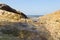 View through the rocks in an endless sea