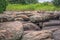 View of rocks of the Lucala river, in the water bodies of Kalandula, with signatures carved in the rocks of tourists who pass