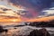 View of a rocky Cape Town city coastline at sunset, Cape Town