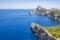 View of a rocky cliff on a sunny day in Formentor cape in Palma de Mallorca, Balearic Islands, Spain