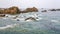 view of rocky coastline in Brittany in rainy day