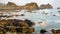 view of rocky shore in Brittany in rainy day