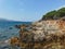 View of the rocky shore of Three island beach