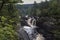 View of Rogie waterfall in summer on the Blackwater river, Wester Ross and Cromarty, Highland , Scotland