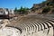 View of the Roman Amphitheatre in the city centre , Malaga, Spain.