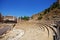 View of the Roman Amphitheatre in the city centre, Malaga, Spain.