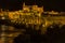 A view of the Roman bridge and old town of Cordoba, Spain at night