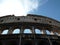 View of the Roman Colosseum outside against the blue sky. August 2012