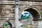 View of Roman Forum through iconic Arch of Titus on the Via Sacra