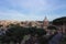 View of Rome from the Capitoline hill.Behind the trees, the Church of Santa Maria Aracoeli, the Colosseum against the background