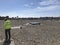 View of roof deck; Roofers inspecting deck; roofing repairs on ballasted EPDM commercial roof