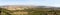 A view from the roof of a Deir Al-Mukhraqa Carmelite Monastery on the adjacent valley with roads, settlements and fields in