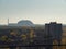 View from roof of ghost town Pripyat, post apocalyptic city and new sarcophagus of Chernobyl nuclear plant autumn season in