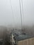 view of the roof of the house on a foggy cold morning