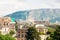 View of the roofs of Geneva city and mountains