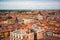 View on roofs of most romantic city of Italy Verona, Veneto. Blue sky above red roofs of medieval city. Spring in italian city.