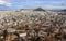 View of the rooftops of Athens with their interesting patios and roof gardens looking north over Thiseio toward Mount Lycabettus p