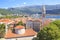 View of the rooftops and the bay of Budva in Montenegro in the summer sunny day