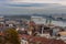 A view of the rooftops of Budapest, and the river Danube, on an autumn day