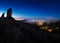 View of Roque Nublo peak and Artenara village by night