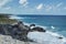 A view of rough sea water splashing against the rocks in Isla isla mujeres near Cancun, Mexico