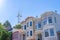 View of rowhouses and Sutro Tower from below at San Francisco, CA