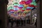 View of Royal Village decorated with umbrellas. It is located near Madeleine in 8th district. Paris. France.