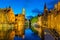 View from the Rozenhoedkaai of the Old Town of Bruges at dusk