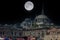 View of Ruestuem Pasha Mosque in Istanbul during night with full moon