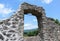 View through a ruin window to the beautiful Tuscan summer landscape and the Malgrate Castle, from Virgoletta, an ancient mountain