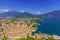 View from ruined castle Il Bastione at the historic district and the port of Riva del Garda