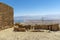 View the ruins, high on Mount Massada. Israel, in the distance the Dead Sea and the mountains