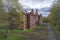 View of the ruins of mansion in the noble estate `Knyazhya Gorka` shooting from a quadcopter. Pskov region