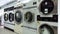 View of running washing machines in laundry room