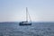 View of a sail boat, Aegean sea and landscape captured in Ayvalik area of Turkey