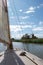 View from a sailing boat near a windmill / wind pump on the Norfolk Broads