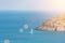 View of sailing boat and Spinalonga Island on Crete, Greece