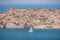 View of sailing boat and Spinalonga Island on Crete, Greece