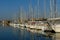 View of sailing boats moored in raw at the marina of Lorient, Brittany, France.