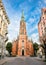 View on Saint Gertrude Old Church and bright blue sky, Riga Latvia. St.