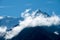 View from Saint-Gervais-les-Bains to white top of Mont Blanc mountaine range in summer