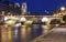 The view of Saint-Michel bridge and the Seine River at night, Paris, France