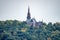 view on saint rochus chapel from hiking train to niederwald statue