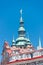 View of Saint Thomas Church main bell tower at blue sky background, Prague, Czech Republic, summer