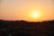 View of the salt lake with a beautiful pink water. Sunset orange sun, the neighborhood.Las salinas, Torrevieja, Spain