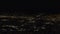 View of Salt Lake City from airplane at night during landing approach