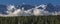 View of San Juan Mountains with clouds below peaks outside Ridg