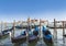 View from San Marco square of the cathedral of San Giorgio Maggiore, the Venetian lagoon and gondolas. Venice