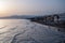 View on sandy beach of Sperlonga on sunset, ancient Italian city in province Latina on Tyrrhenian sea, tourists vacation